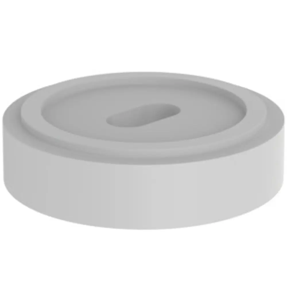 Runder, flacher Untersetzer in Grau, geeignet für Fliesenanwendungen. Produkt von Ideal Standard zur Unterstützung bei der Fliesenverlegung.